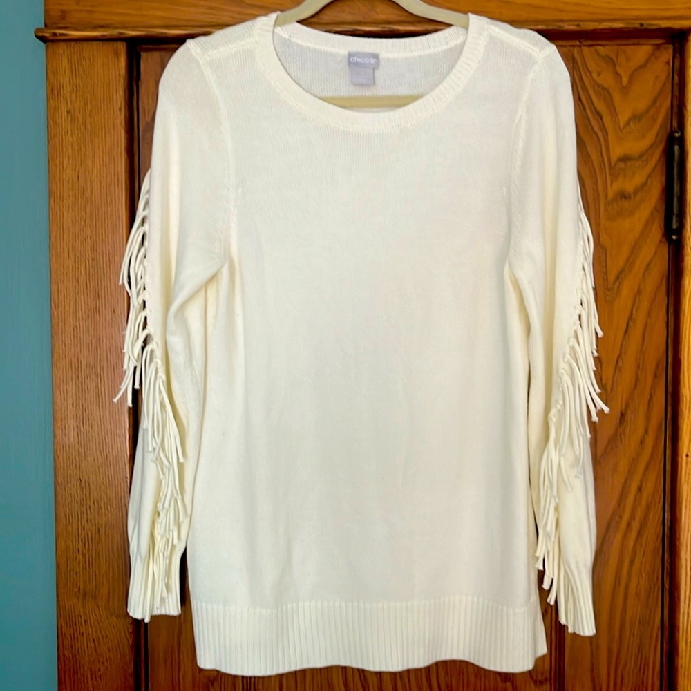 Ivory/cream colored sweater with fringe sleeves